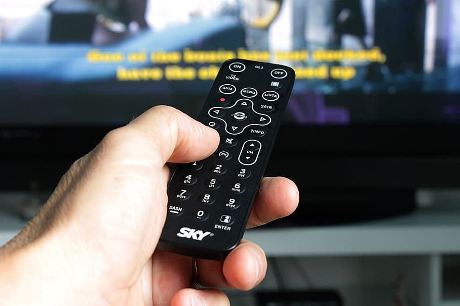 selective, focus photography, person, holding, remote, television, remote control, tv, electronic, facility