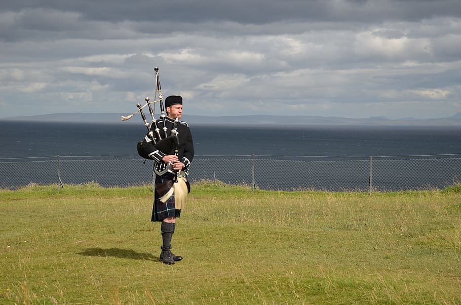 Scotland, Isle Of Skye, Scottish, Piper, gun, standing, field, rifle, weapon, outdoors