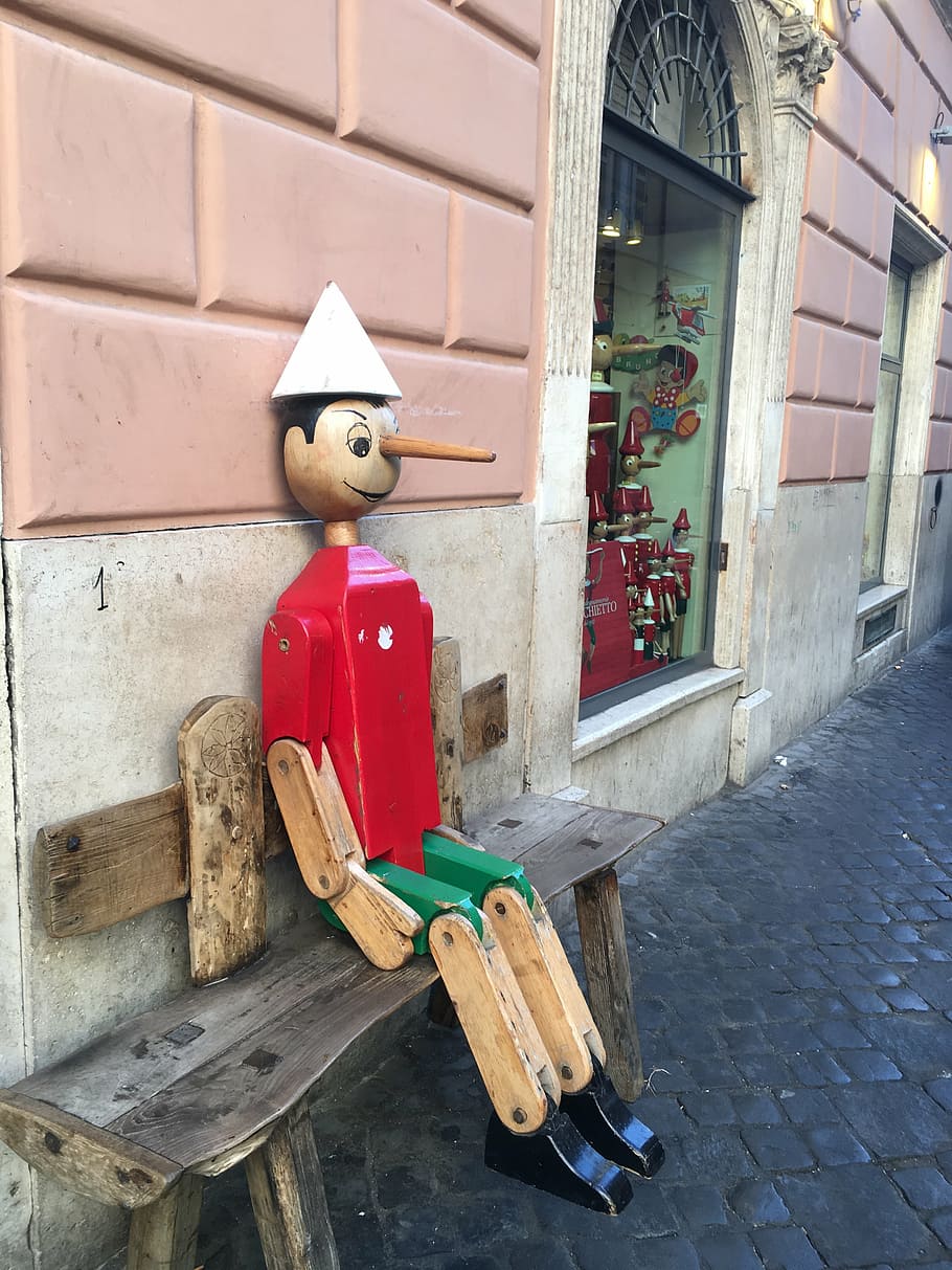 rome, pinocchio, toy, built structure, wood - material, architecture, red, building exterior, day, representation