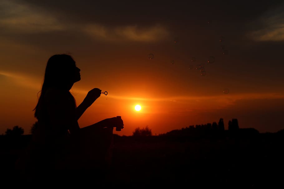 silhouette photo, woman, holding, bubble, making, stick, silhouette, sunset, sun, shadows