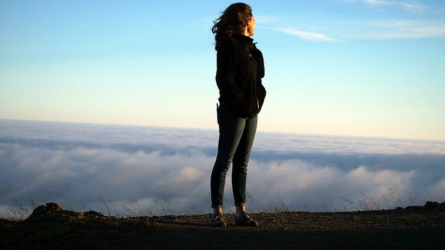 woman, standing, hill, facing, white, clouds, daytime, heights, success, successful