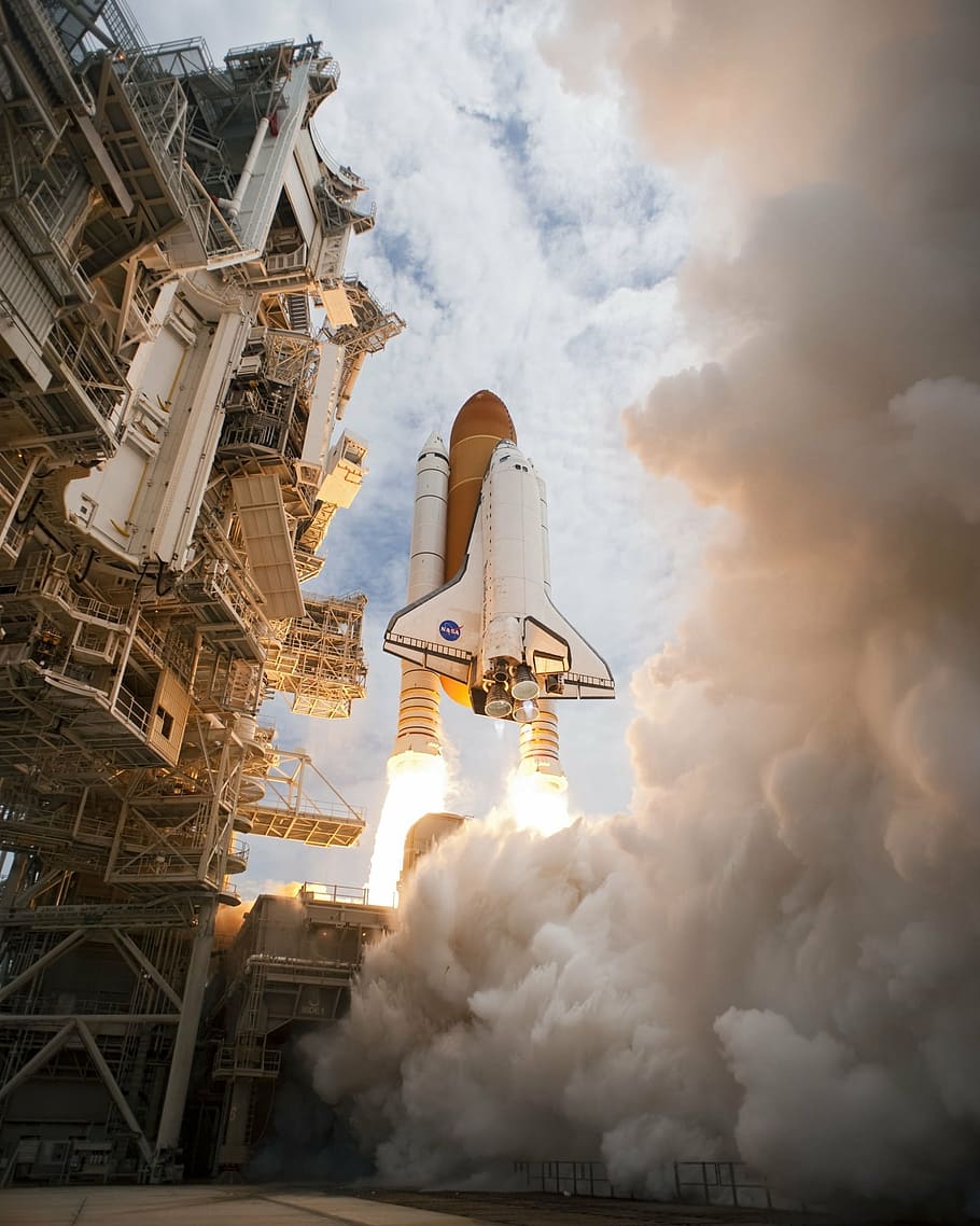 low, angle-view, launching, nasa shuttle spaceship, space shuttle atlantis, liftoff, launch, launchpad, rocket boosters, exploration
