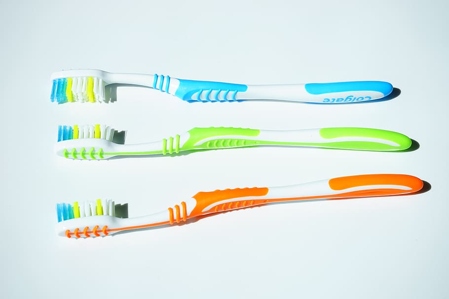three, blue, green, orange, colgate toothbrushes, tooth brushes, hygiene, clean, dental care, dental hygiene