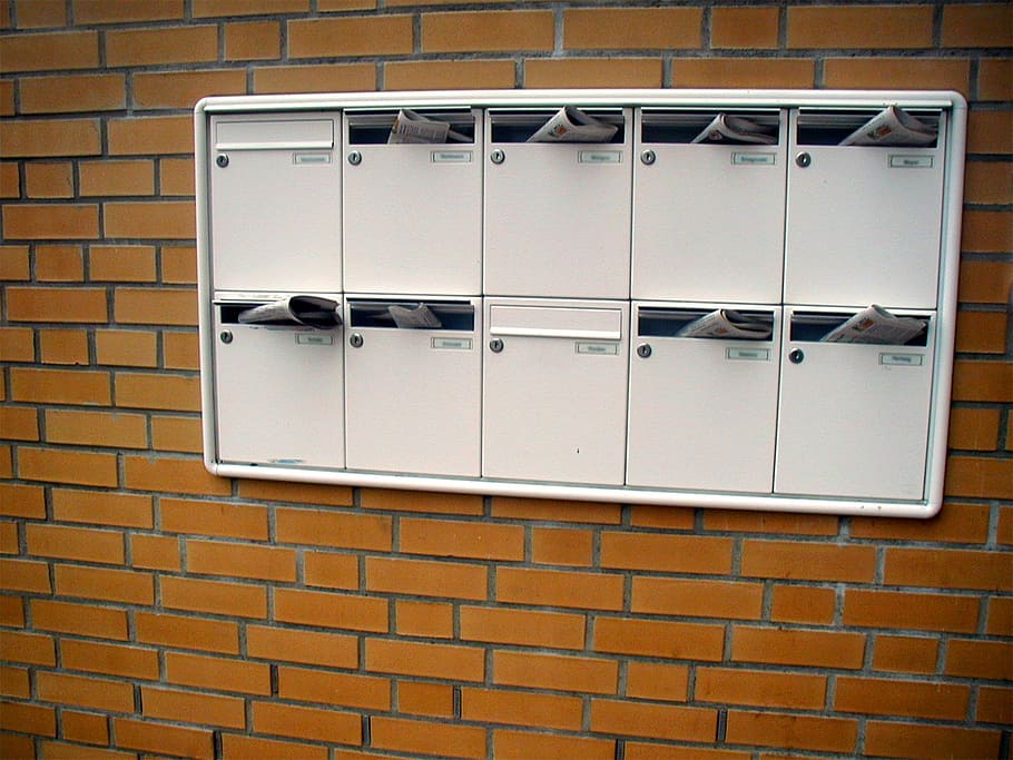 white, metal mail cabinet, newspapers, mailbox, letter boxes, newspaper, mail, post, send, letter box system