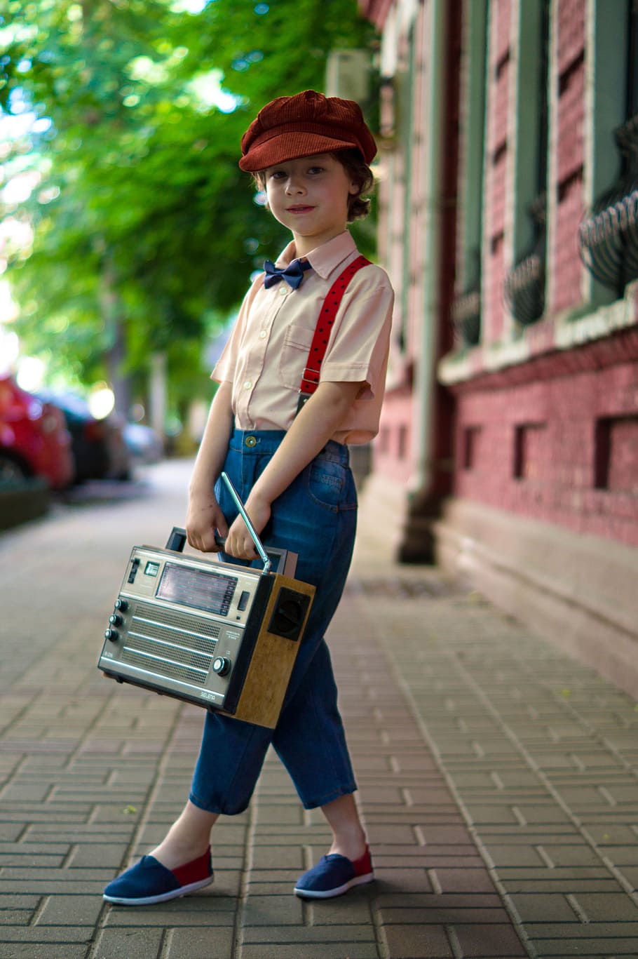 girl carrying radio, boy, radio, retro, vintage, hat, kids, classic, reportage, old