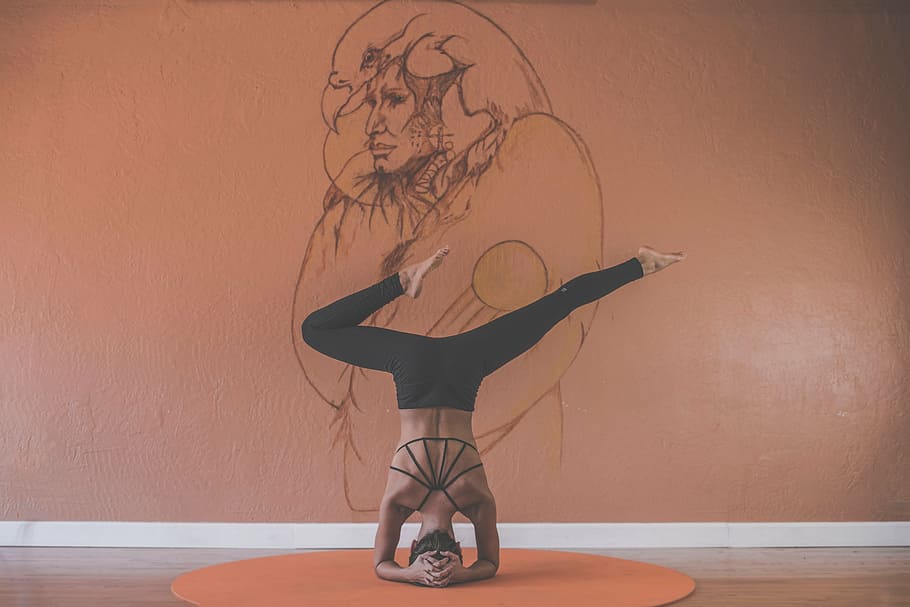 woman, yoga, wall, person, headstand, near, brown, paint, pose, stretch