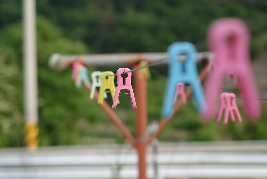 pink, yellow, plastic clothes clip, Laundry, Clothes Peg, Summer, hanging, focus on foreground, day, clothespin