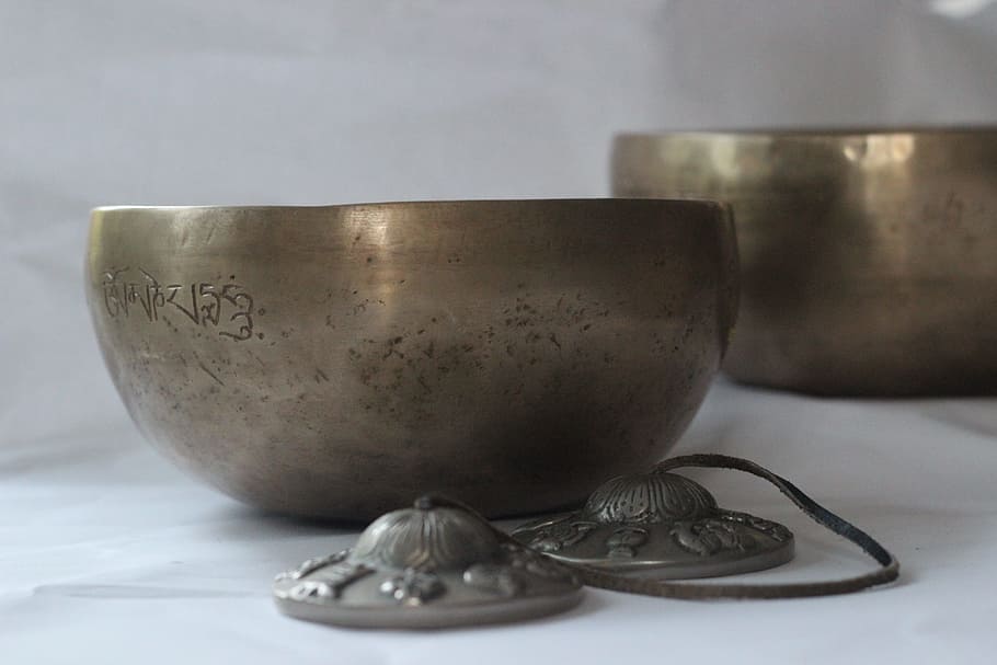 gold bowl, white, surface, grey, steel bowl, singing bowls, singing bowl massage, wellness, spa, cymbals