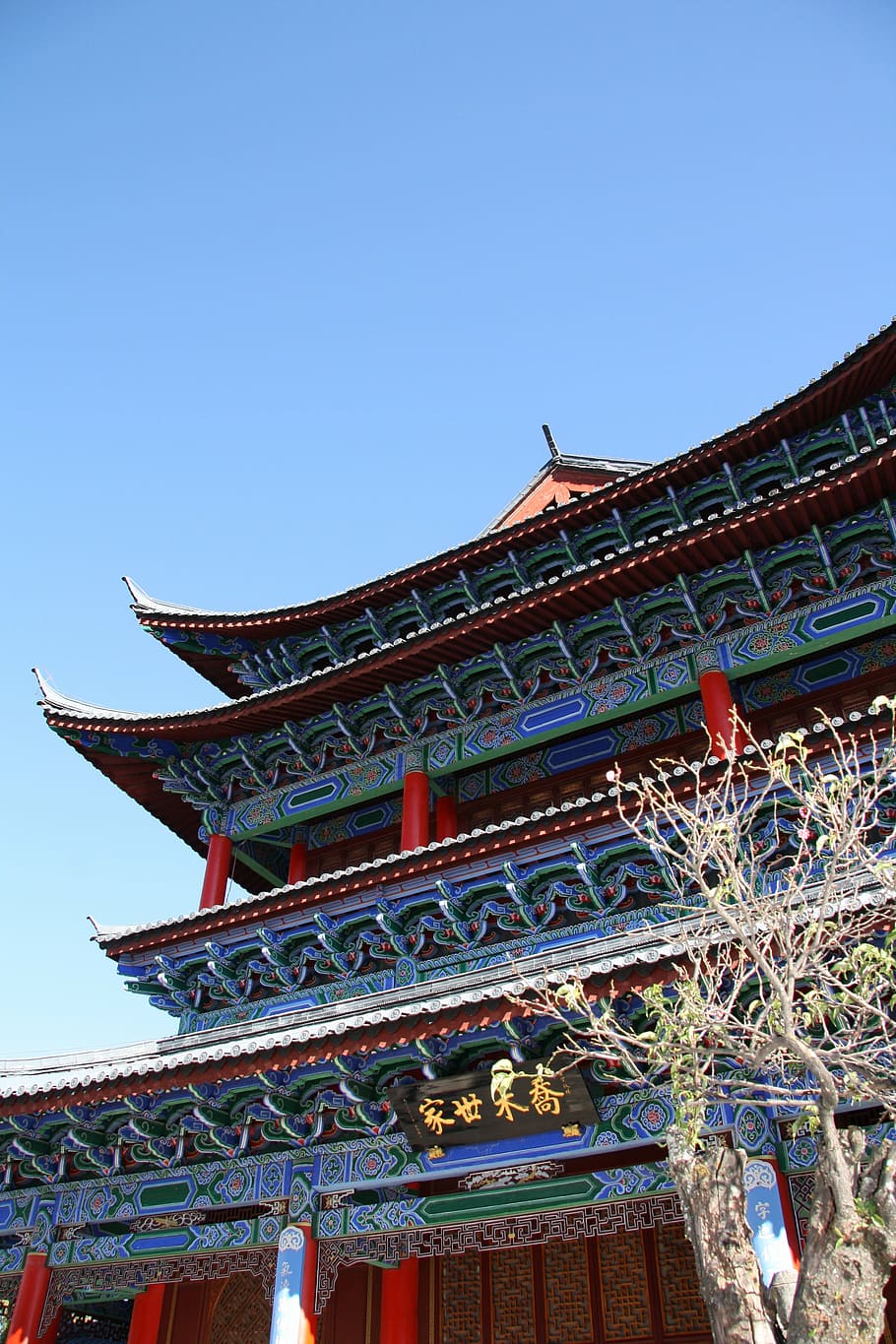 in yunnan province, the scenery, building, architecture, built structure, low angle view, belief, religion, sky, clear sky