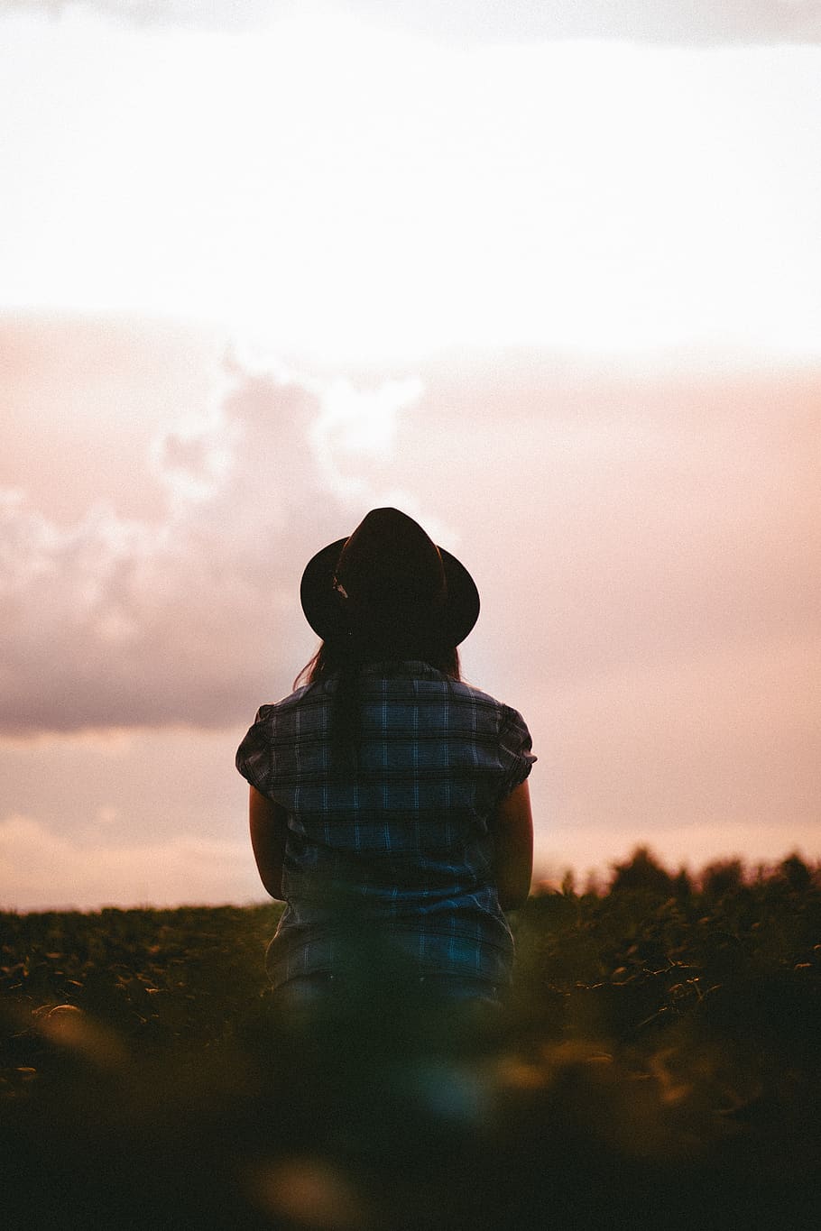 people, woman, checkered, grass, sunset, alone, clouds, sky, hat, real people