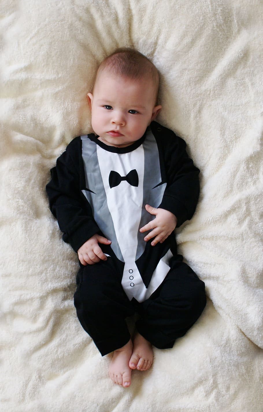 person, showing, baby, tuxedo-themed footie, babe, newborn, gentleman, kid, childhood, small child