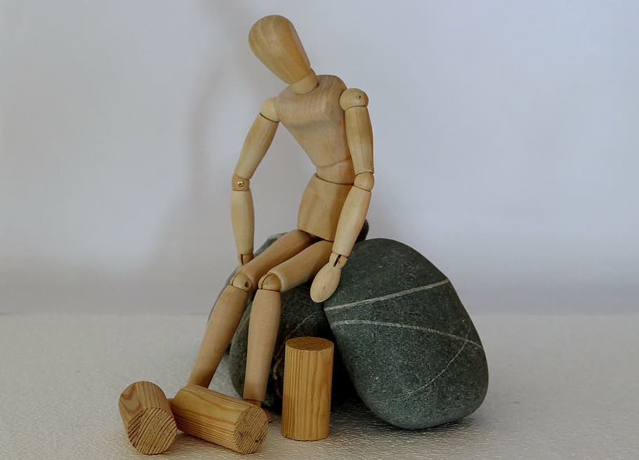 human, shaped, wooden, toy, sits, black, stones, holzfigur, hopeless, stranded