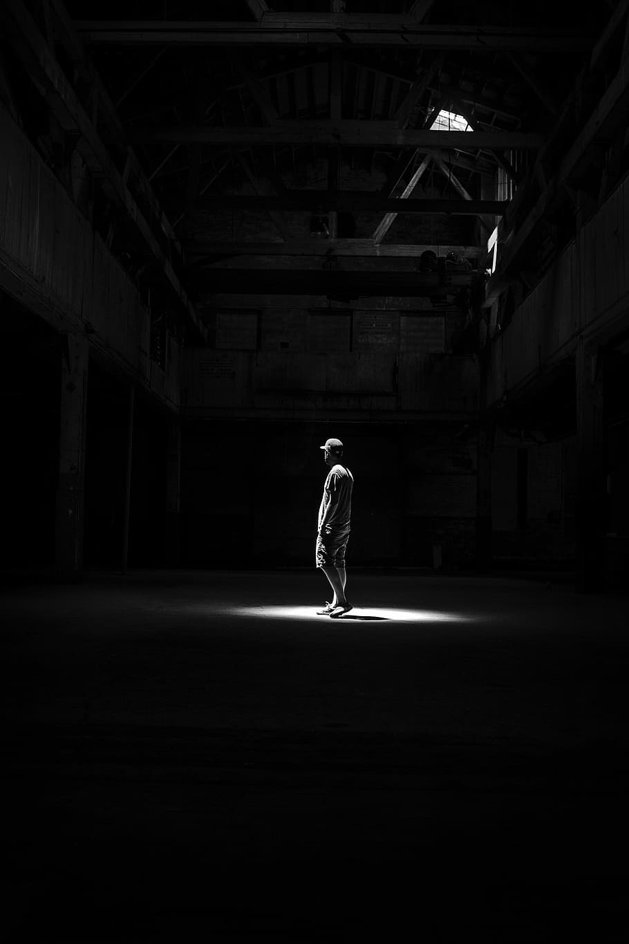 grayscale photography, man, standing, room, dim, light, grayscale, photography, one Person, dark
