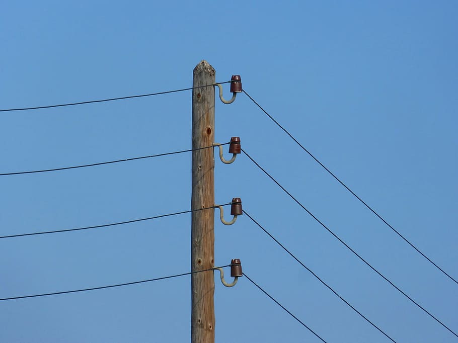 electric pole, power line, insulators, old, cable, electricity, low angle view, blue, technology, connection