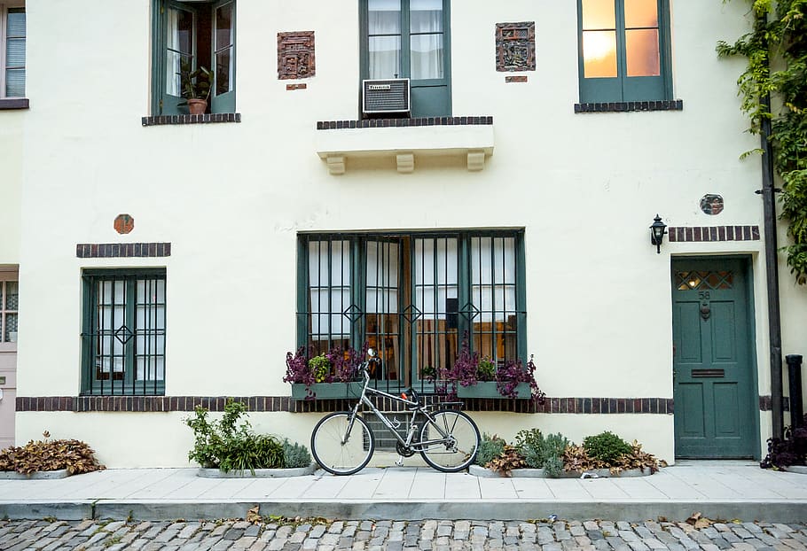 bike, bicycle, building, windows, shutters, sidewalk, street, road, cobblestone, city