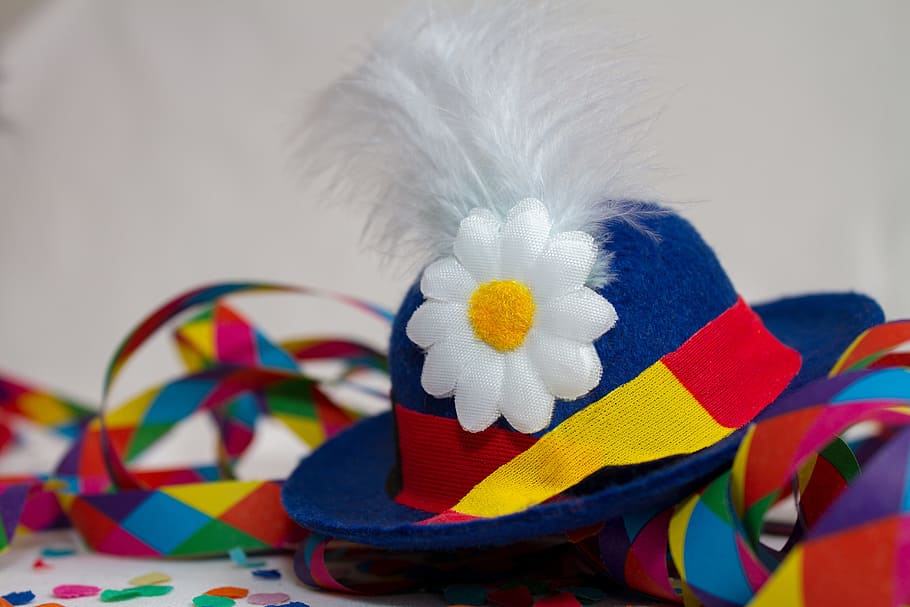 blue flower-accent hat, carnival, party, hat, streamer, colorful, feather, flower, blue, confetti