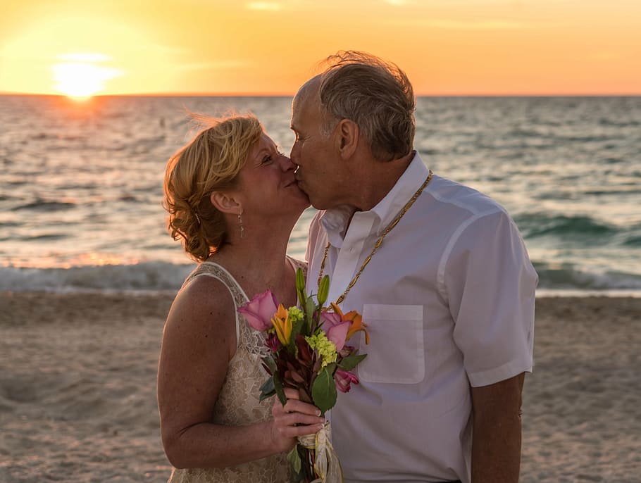 man, woman, kissing, ocean, beach wedding, people, person, beach, wedding, sunset
