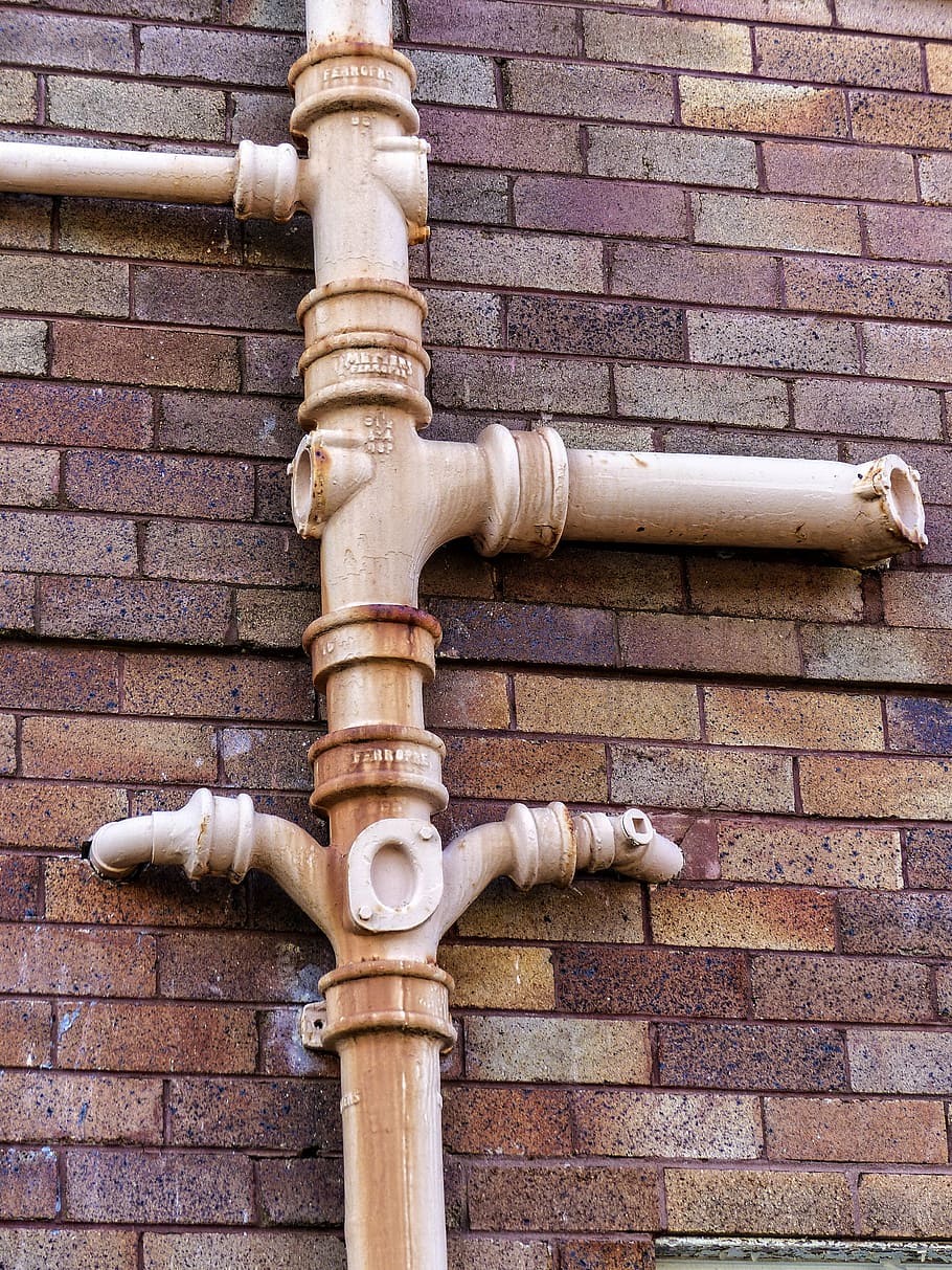 brown, metal tube, mounted, brick wall, sewage, pipe, metal, iron, old, waste