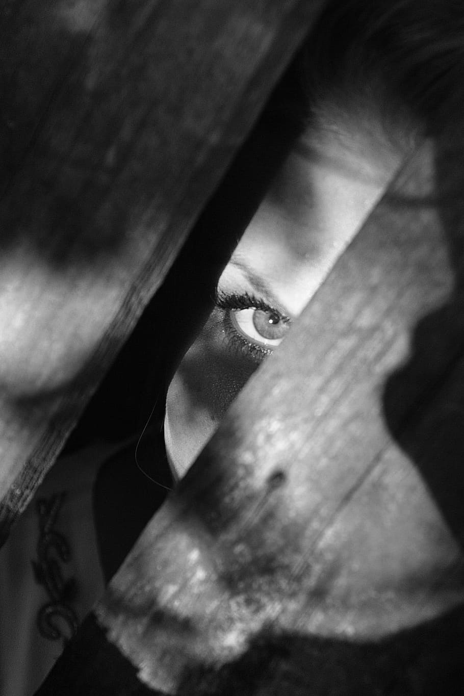 person, peeking, wooden, floor, black and white, woman, dark, hidden, eye, fear