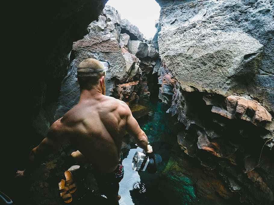 people, man, rocks, water, cave, flashlight, slippers, adventure, outdoor, shirtless