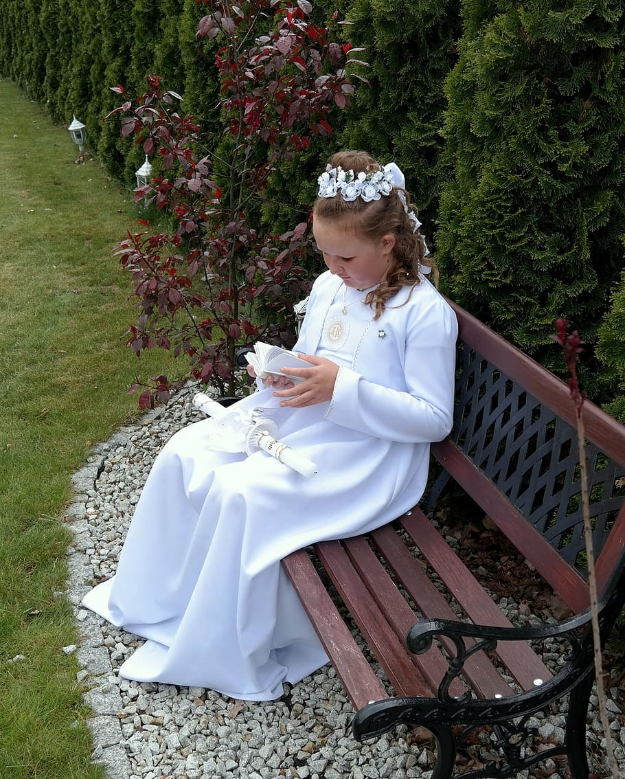 first communion, catholic, religion, plant, real people, one person, females, women, leisure activity, lifestyles