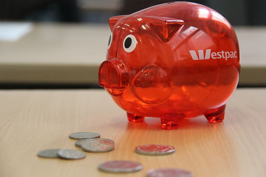 red, estpac coin bank, brown, wooden, table, piggybank, piggy, coin, savings, finance