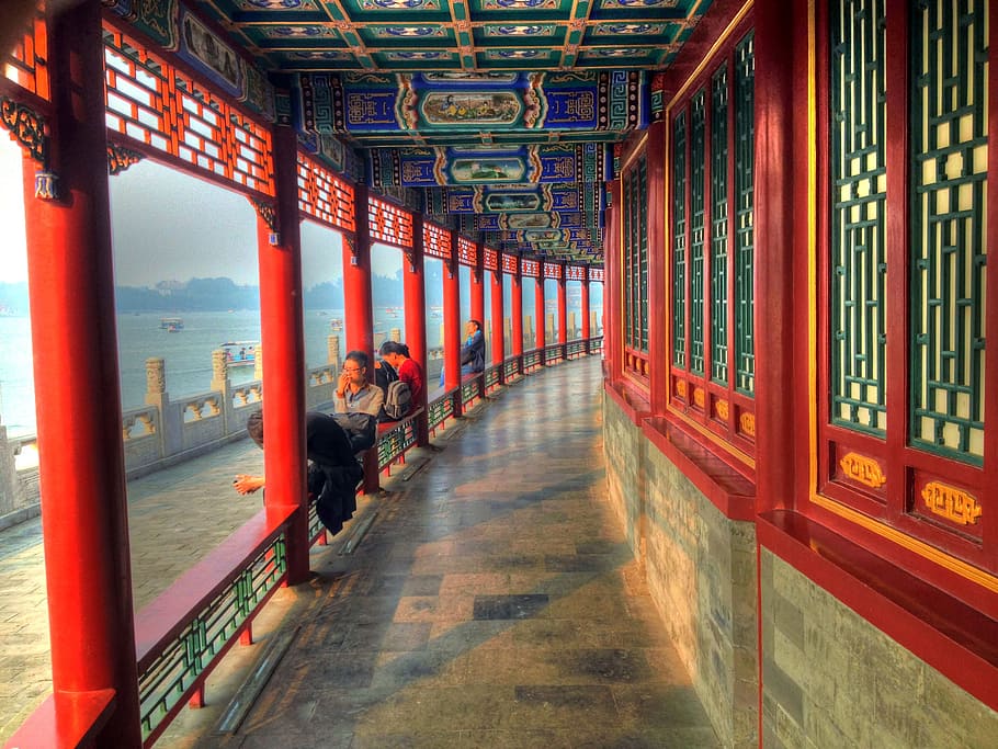 people, sitting, red, wooden, handrail, corridor, beihai, temple, forbidden palace, beijing