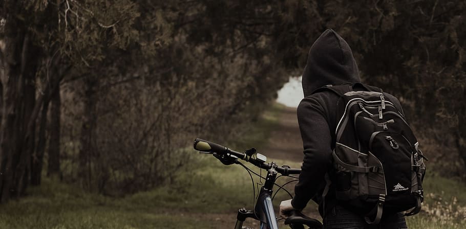 man, wearing, black, pullover hoodie, walking, dirt road, forest, cyclist, nature, young