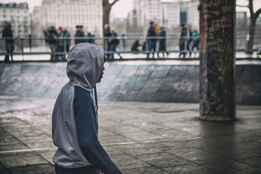 young, man, wearing, hooded, top, stands, london, england, Southbank, London, England