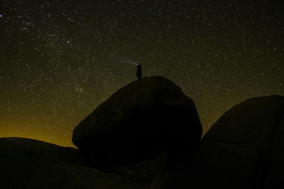 person, standing, boulder, night, nature, landscape, dark, travel, adventure, stars