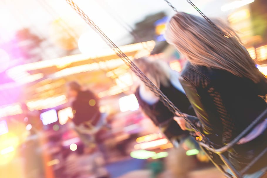 young, girl, enjoying, crazy, ride, Ride on, Swing Carousel, carousels, colorful, evening