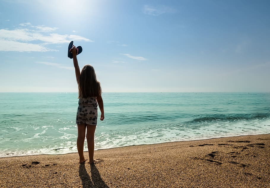 woman, raising, hand, front, ocean, girl, silhouette, beach, flipflops, happy