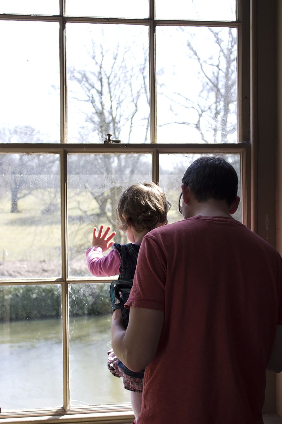 father, daughter, window, child, looking, architecture, interior, home, light, glass