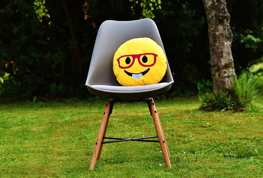 smiley, funny, cheerful, colorful, emoticon, laugh, yellow, chair, meadow, happy