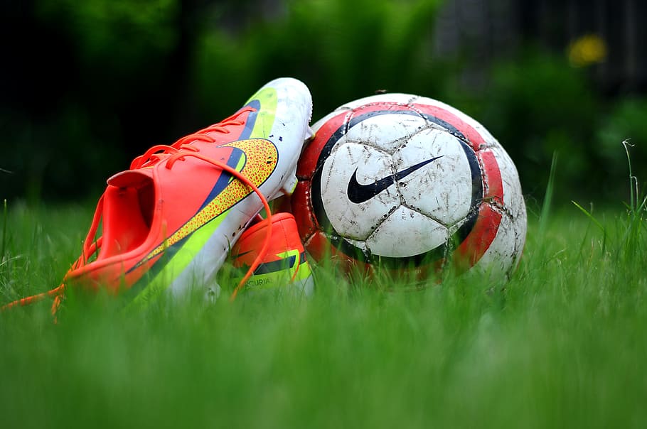 close-up photo, cleats, soccer ball, green, grass, shoes, nike, football, activity, action
