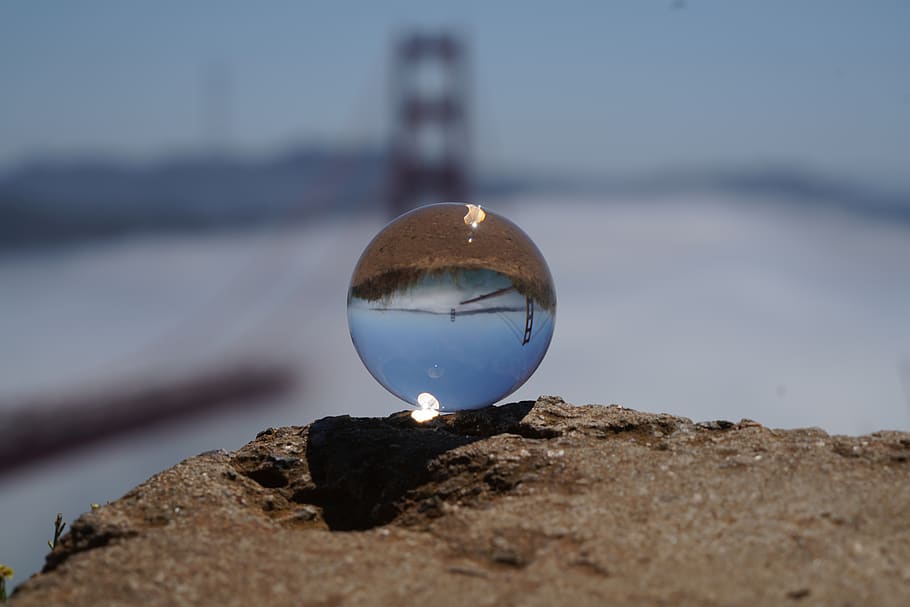 lens ball, golden gate bridge, stone, grass, fog, clouds, reflection, sphere, crystal ball, nature