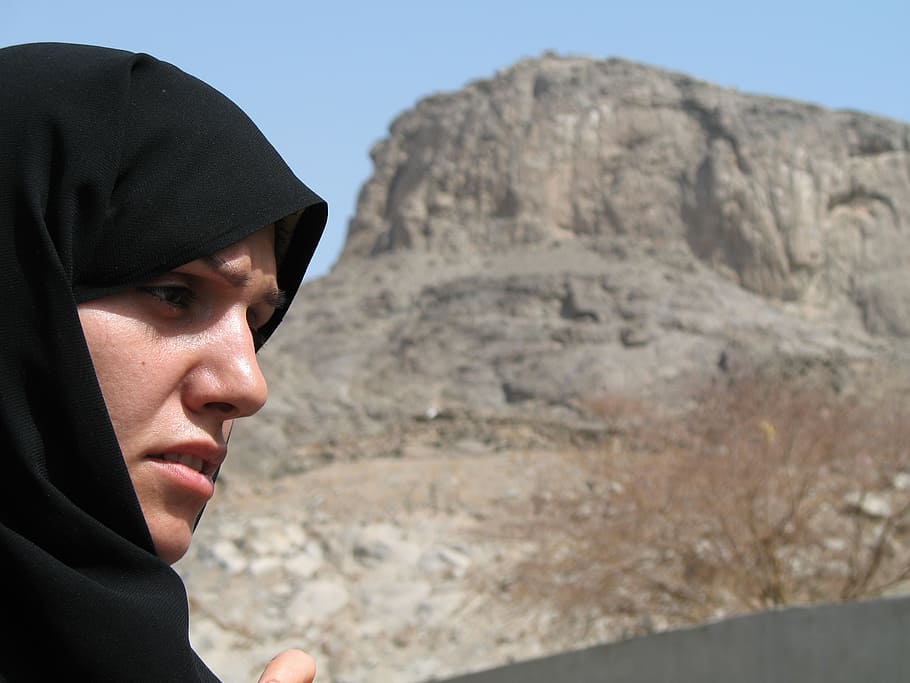 woman, front, brown, rock formation, muslim, face, person, clothing, burka, girl