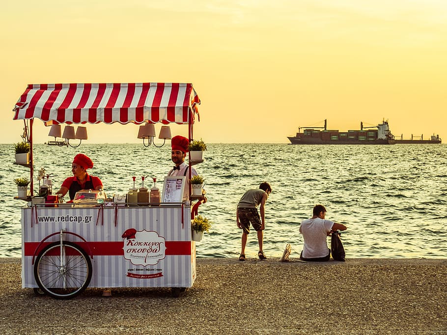 two, person, standing, food cart, beach, vendor kiosk, vintage, promenade, afternoon, people