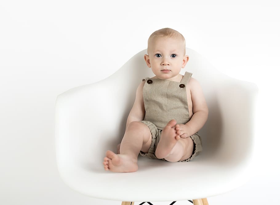 child, baby, minimalist, white background, cute, portrait, sitting, chair, young, full length