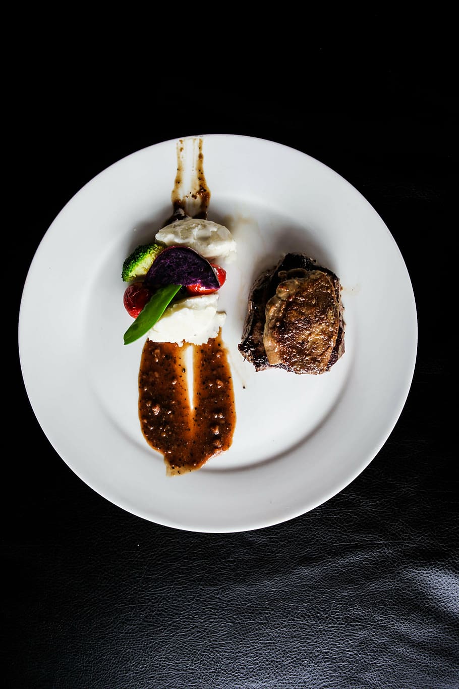 cooked, steak, vegetable dish, foie gras, black pepper, plate, food and drink, food, studio shot, black background