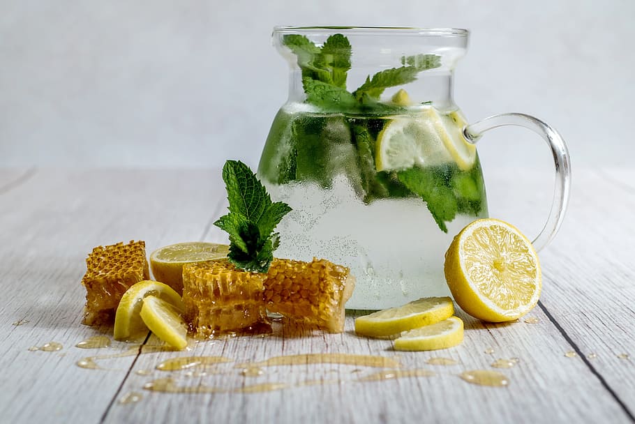 clear, glass pitcher, green, vegetable, slice lemon, lemon, honey, homemade lemonade, drink, glass