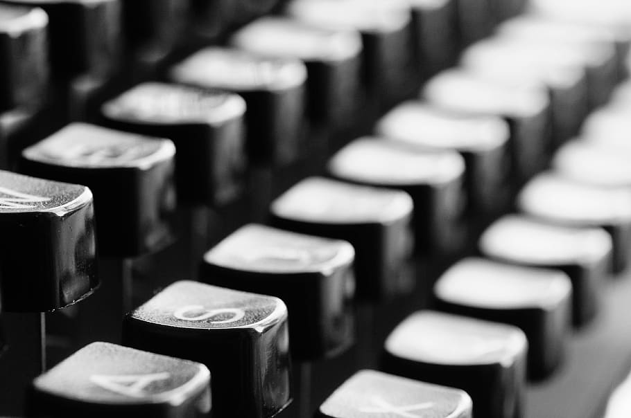 black typewriter keys, typewriter, keys, mechanically, letters, office, selective focus, indoors, in a row, focus on foreground