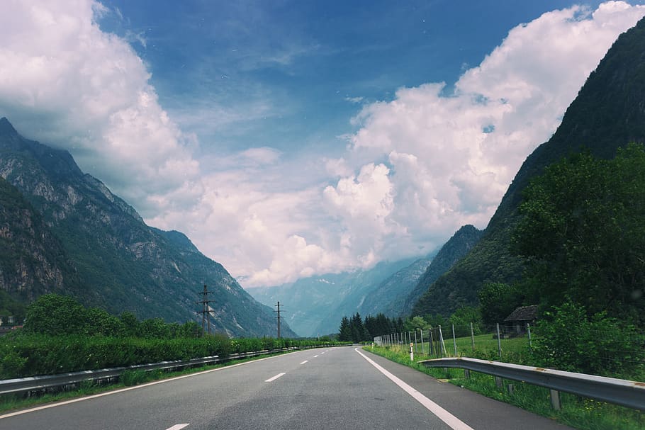 road, highway, railing, blue, sky, clouds, mountains, travel, power lines, driving