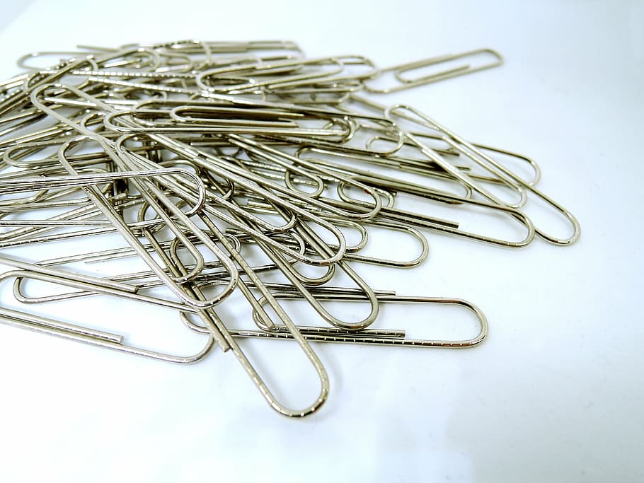 stationery, paperclip, office supplies, metal, still life, paper clip, clip, indoors, close-up, white background