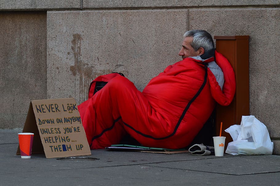man, red, sleeping, bag, brown, cardboard box, homeless man, homeless, advice, orange clothes