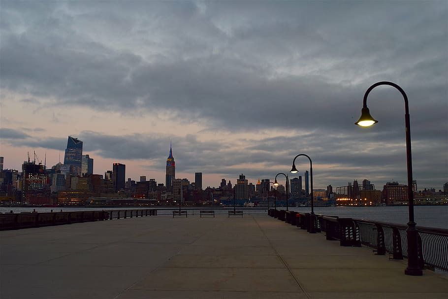 black, steel post lamp, building, new york city, skyline, twilight, lights, lamp post, clouds, sky