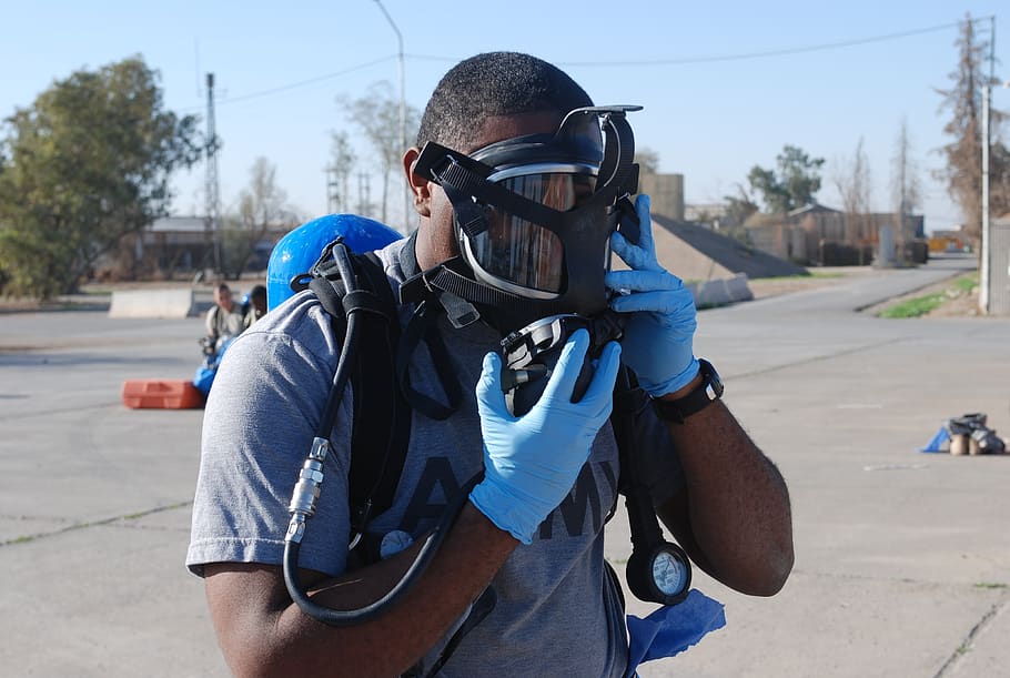 african american, chemical, first responder, male, science, petrochemical, gas mask, real people, one person, helmet