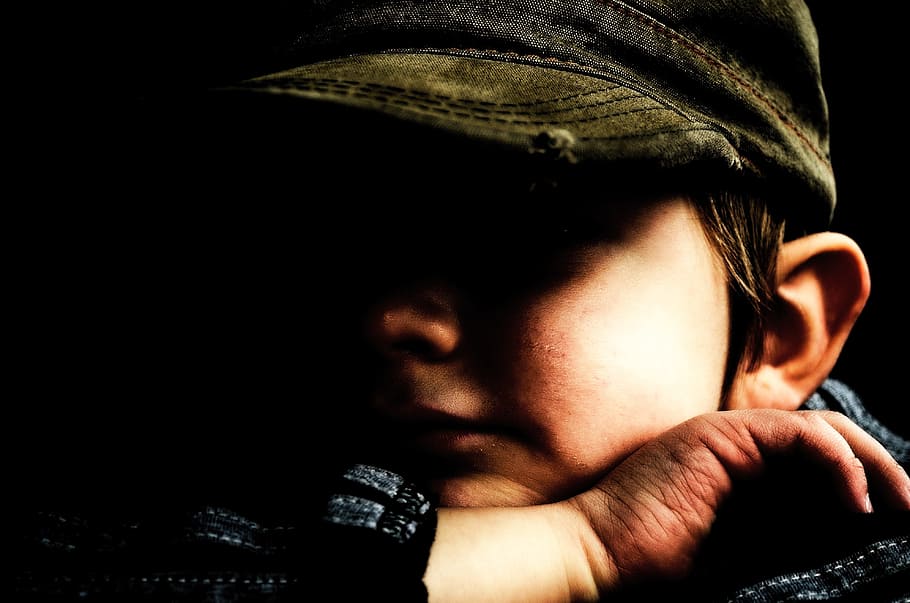 person, wearing, brown, curve-brimmed cap, Child, Sadness, Face, People, boy, portrait