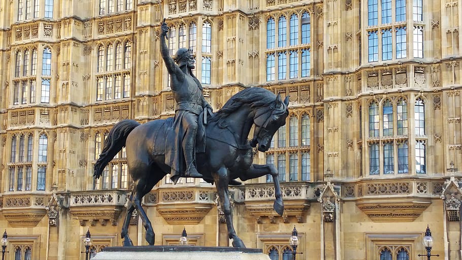 a kings horse, medieval horseman, english king, sculpture, architecture, built structure, building exterior, representation, statue, art and craft