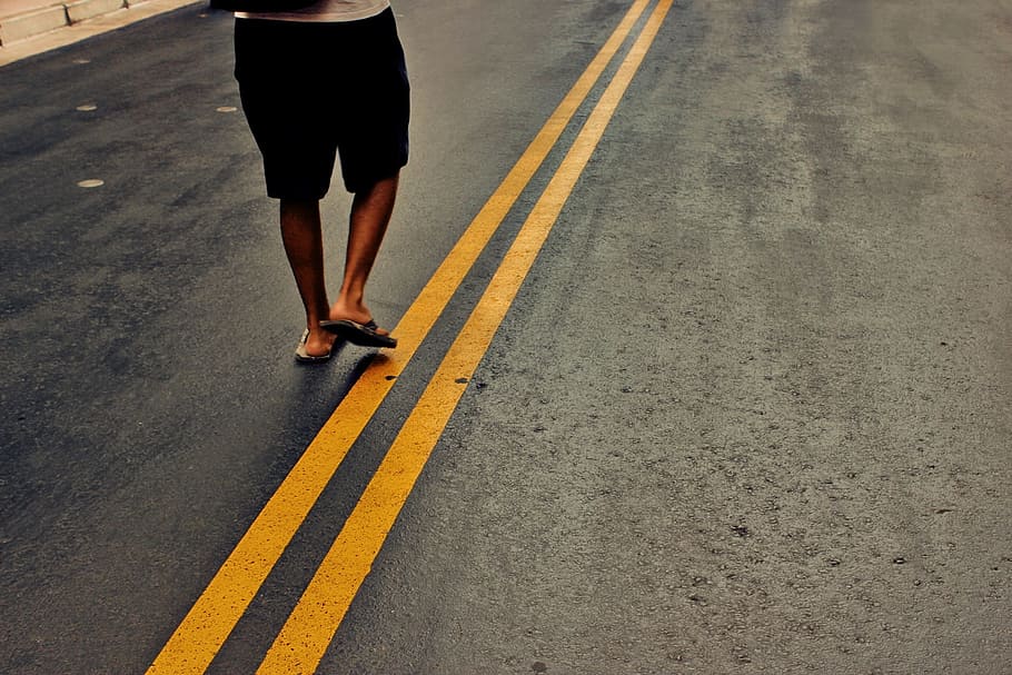 wearing, black, shorts, standing, gray, concrete, top, road, Person, Walking, Street